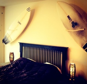 surfboards mounted to wall